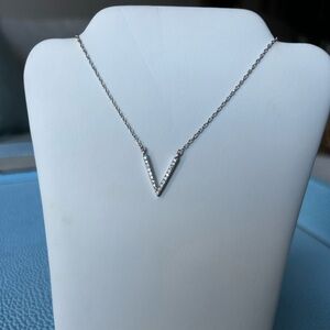 New in box Touchstone crystal by Swarovski Tiny V Necklace